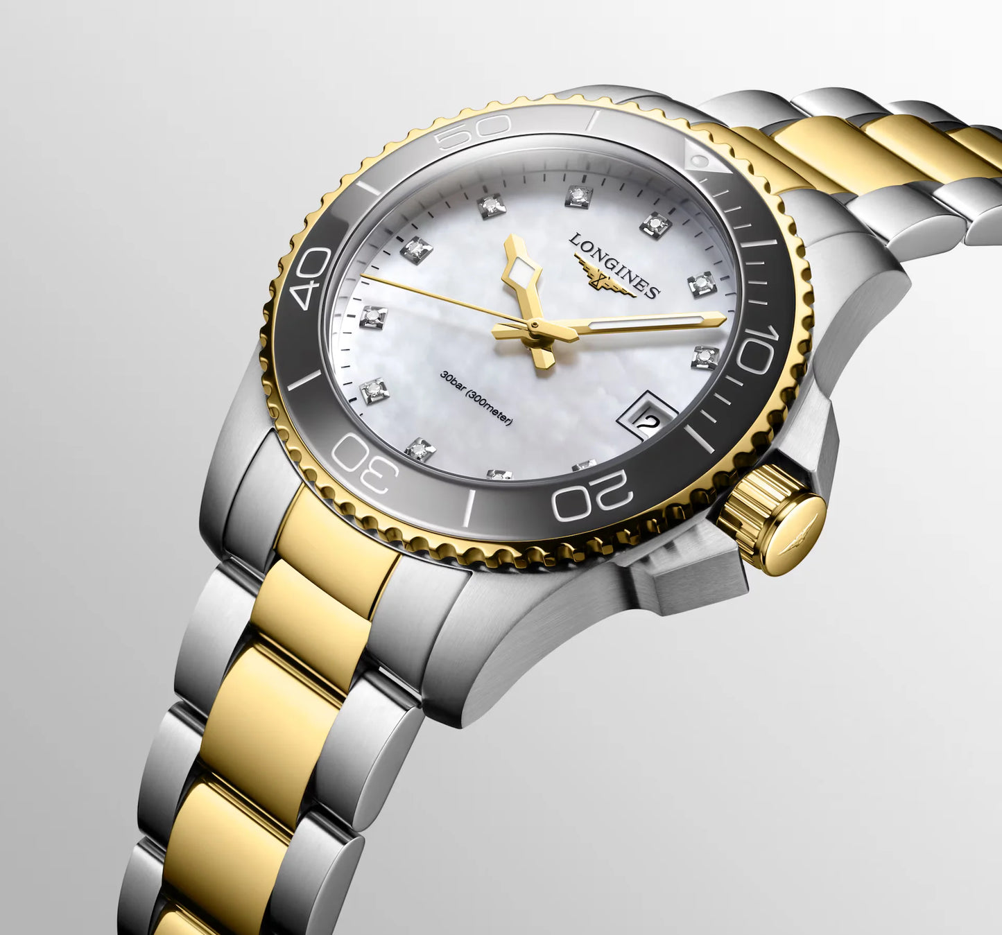 Longines HydroConquest Quartz 32mm, Mother-of-Pearl Dial, Stainless Steel and yellow PVD coating